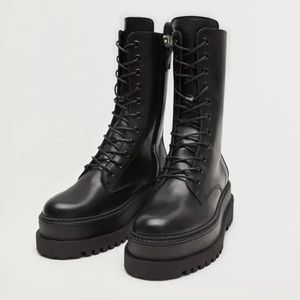 Lace-up leather boots
